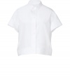 An ultra modern take on the classic shirt, Jil Sanders boxy white button-down is a characteristic and chic way to wear the brands iconic minimalist look - Small pointed collar, short sleeves, buttoned cuffs, button-down front - Cropped, boxy cut - Wear with high-waisted trousers and streamlined leather accessories