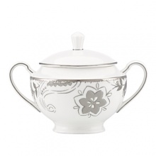 A soft floral motif exquisitely adorns Lenox's Paisley Terrace white-bodied porcelain sugar bowl. Mica accents and gleaming platinum trim complete the traditional-modern look. A soft floral motif exquisitely adorns Lenox's Paisley Terrace white-bodied porcelain sugar bowl. Mica accents and gleaming platinum trim complete the traditional-modern look.
