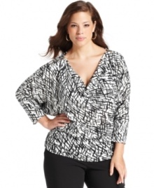 Liven up your day-to-play look with Alfani's three-quarter-sleeve plus size top, featuring a graphic print-- dress it up with trousers or down with denim. Liven up your day-to-play look with Alfani's three-quarter-sleeve plus size top, featuring a graphic print-- dress it up with trousers or down with denim.