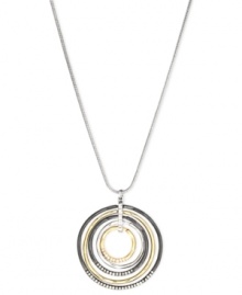 Round and resplendent. This necklace from Nine West is crafted from silver-tone mixed metal, with a pendant made of the same-plus gold-tone and hematite-tone mixed metal-for a stunning effect. Approximate length: 16 inches + 2-inch extender. Approximate drop: 2 inches. Approximate diameter: 1-7/8 inches. Round and resplendent. This necklace from Nine West is crafted from silver-tone mixed metal, with a pendant made of the same-plus gold-tone and hematite-tone mixed metal-for a stunning effect. Approximate length: 16 inches + 2-inch extender. Approximate drop: 2 inches. Approximate diameter: 1-7/8 inches.