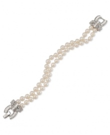 A glamorous touch, twice over. This double-row bracelet from Carolee is crafted from silver-tone mixed metal with glass pearls adding a look that's both timeless and elegant. Approximate length: 7-1/2 inches. A glamorous touch, twice over. This double-row bracelet from Carolee is crafted from silver-tone mixed metal with glass pearls adding a look that's both timeless and elegant. Approximate length: 7-1/2 inches.