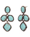 Inspire your look with a little bohemian beauty. Monet's chic drop earrings combine a rich bronze tone mixed metal setting with bright reconstituted turquoise stones. Approximate drop: 1-3/4 inches.