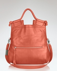 Vacation looks love this lush tote, rendered in tropical-hued leather for a fresh take on this tried and true Foley + Corinna bag. Vacation looks love this lush tote, rendered in tropical-hued leather for a fresh take on this tried and true Foley + Corinna bag.
