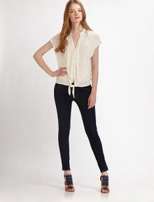 A self-tied knot at the hemline is a beautiful vintage-inspired addition to this lightweight top. Slit v-neckDropped shouldersShort cap sleevesButton-down frontSelf-tie at hemAbout 23 from shoulder to hemViscoseMachine washImportedModel shown is 5'10 (177cm) wearing US size Small. A self-tied knot at the hemline is a beautiful vintage-inspired addition to this lightweight top. Slit v-neckDropped shouldersShort cap sleevesButton-down frontSelf-tie at hemAbout 23 from shoulder to hemViscoseMachine washImportedModel shown is 5'10 (177cm) wearing US size Small.