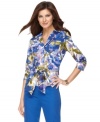 A watercolor-inspired floral print freshens up this crisp shirt from Jones New York Signature. A tie at the waist lends a flattering silhouette, too!