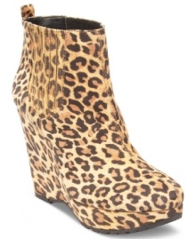 Stomp around in roaring style. BCBGeneration's Vance platform wedges feature an amazing animal print and a tall wedge heel. Stomp around in roaring style. BCBGeneration's Vance platform wedges feature an amazing animal print and a tall wedge heel.