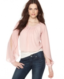 Like pretty petal, BCBGeneration's blouse features delicately-wrapped sleeves for a fresh look! The cropped hem looks great with high-waisted jeans and skirts, too. Like pretty petal, BCBGeneration's blouse features delicately-wrapped sleeves for a fresh look! The cropped hem looks great with high-waisted jeans and skirts, too.