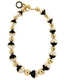 A trio of elegance, from Anne Klein. This statement necklace grabs attention with sparkling crystals, glossy blacks and golden shine. Finished with a toggle closure. Crafted in gold tone mixed metal. Approximate length: 16 inches + 1-inch extender. A trio of elegance, from Anne Klein. This statement necklace grabs attention with sparkling crystals, glossy blacks and golden shine. Finished with a toggle closure. Crafted in gold tone mixed metal. Approximate length: 16 inches + 1-inch extender.