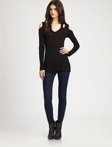 Clever cutout shoulders and a lengthy silhouette renew this lightweight must-have. V-neckCutout shouldersLong sleevesLonger length hits below the hips79% viscose/15% wool/6% spandexDry cleanMade in USA of imported fabricModel shown is 5'9½ (176cm) wearing US size Small. Clever cutout shoulders and a lengthy silhouette renew this lightweight must-have. V-neckCutout shouldersLong sleevesLonger length hits below the hips79% viscose/15% wool/6% spandexDry cleanMade in USA of imported fabricModel shown is 5'9½ (176cm) wearing US size Small.