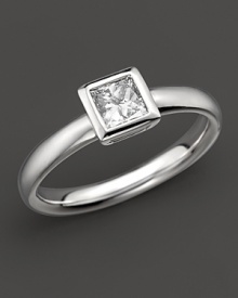 A sophisticated diamond ring with bezel-set, princess-cut stone. A sophisticated diamond ring with bezel-set, princess-cut stone.