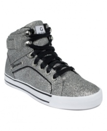 Sporty shimmer never looked so good. G by GUESS' Opall2 Hi Top sneakers feature a glitter upper and contrasting lace-up vamp. Sporty shimmer never looked so good. G by GUESS' Opall2 Hi Top sneakers feature a glitter upper and contrasting lace-up vamp.