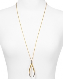 A clean geometric shape hangs delicately on this House of Harlow 1960 pendant necklace. Crafted from 14-karat yellow gold with black pave stones, this charm styles sweetness with an edge. A clean geometric shape hangs delicately on this House of Harlow 1960 pendant necklace. Crafted from 14-karat yellow gold with black pave stones, this charm styles sweetness with an edge.