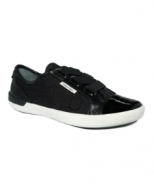 Step into fashion. Calvin Klein's Trinah Logo sneakers are proof that even sneakers are embracing the capped-toe trend. Step into fashion. Calvin Klein's Trinah Logo sneakers are proof that even sneakers are embracing the capped-toe trend.