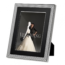 This new collection from bridal favorite Vera Wang updates the designer's popular With Love collection in striking black enamel and silver. Featuring a geometric design, it is at once Art Deco-inspired and thoroughly modern. This new collection from bridal favorite Vera Wang updates the designer's popular With Love collection in striking black enamel and silver. Featuring a geometric design, it is at once Art Deco-inspired and thoroughly modern.