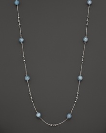 This sterling silver necklace, gleaming with aquamarine, makes an elegant statement. By Di MODOLO. This sterling silver necklace, gleaming with aquamarine, makes an elegant statement. By Di MODOLO.