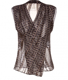 Luxurious top in black and mustard yellow patterned silk - Transparent and sexy, perfect for parties and evening events - Feminine, wrap design creates v-neck - Sleeveless - Pair with black, cropped leather pants, peep-toe heels and your favorite clutch Luxurious top in black and mustard yellow patterned silk - Transparent and sexy, perfect for parties and evening events - Feminine, wrap design creates v-neck - Sleeveless - Pair with black, cropped leather pants, peep-toe heels and your favorite clutch