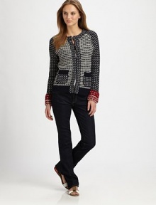 A striking knit where inverted colors and contrast trim co-exist flawlessly.Round neckLong sleevesContrast cuffsHook-and-eye closurePatch pocketsAbout 22 from shoulder to hemMerino woolDry cleanImportedModel shown is 5'10 (177cm) wearing US size Small. A striking knit where inverted colors and contrast trim co-exist flawlessly.Round neckLong sleevesContrast cuffsHook-and-eye closurePatch pocketsAbout 22 from shoulder to hemMerino woolDry cleanImportedModel shown is 5'10 (177cm) wearing US size Small.