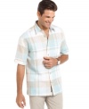 Classic and casual. This large plaid-patterned shirt from Cubavera showcases your laid-back style. (Clearance)