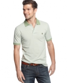 Define classic. Establish your style roots and stay looking great with this striped polo shirt from Izod. Define classic. Establish your style roots and stay looking great with this striped polo shirt from Izod.