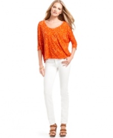 A bright abstract print makes this boxy MICHAEL Michael Kors top a hot pick for a casual summer look! A bright abstract print makes this boxy MICHAEL Michael Kors top a hot pick for a casual summer look!