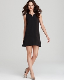 For the minimalist at heart, this Juicy Couture dress masters understated elegance with a clean, black silhouette. Put a shine on the style with metallic accents. For the minimalist at heart, this Juicy Couture dress masters understated elegance with a clean, black silhouette. Put a shine on the style with metallic accents.