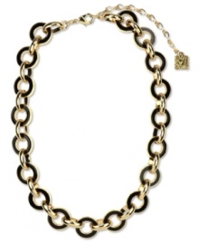 Link together haute fashion. This chunky collar necklace from Anne Klein flaunts jet enamel links for an intriguing look. Crafted in gold tone mixed metal. Approximate length: 16 inches + 3-inch extender. Link together haute fashion. This chunky collar necklace from Anne Klein flaunts jet enamel links for an intriguing look. Crafted in gold tone mixed metal. Approximate length: 16 inches + 3-inch extender.