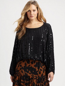 Made from fine Indian silk, a shimmering top with a relaxed-yet-feminine fit you will adore.Round neckLong sleevesPull-on styleAbout 22 from shoulder to hemSilkDry cleanImported Made from fine Indian silk, a shimmering top with a relaxed-yet-feminine fit you will adore.Round neckLong sleevesPull-on styleAbout 22 from shoulder to hemSilkDry cleanImported