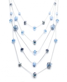 Drape yourself in an array of ocean blues. c.A.K.e. by Ali Khan's stunning five-row design incorporates blue-hued glass crystals in mixed metal. Approximate lengths: 17 to 25 inches + 3-inch extender. Drape yourself in an array of ocean blues. c.A.K.e. by Ali Khan's stunning five-row design incorporates blue-hued glass crystals in mixed metal. Approximate lengths: 17 to 25 inches + 3-inch extender.