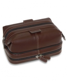 Travel in style with this elegant travel kit by Dopp. This kit includes 3 small bottles and a toothbrush holder. Travel in style with this elegant travel kit by Dopp. This kit includes 3 small bottles and a toothbrush holder.