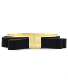 Keep it black tie with a little help from Vince Camuto. A golden setting flaunts a black leather strip in a bow tie design. Crafted in gold tone mixed metal. Approximate diameter: 2 inches. Keep it black tie with a little help from Vince Camuto. A golden setting flaunts a black leather strip in a bow tie design. Crafted in gold tone mixed metal. Approximate diameter: 2 inches.