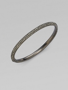 EXCLUSIVELY AT SAKS. Double rows of radiant crystals with a subtle dark cast are hand-set within an antiqued hinged bangle. Crystal Antiqued silvertone Diameter, about 2¼ Push-lock clasp Imported EXCLUSIVELY AT SAKS. Double rows of radiant crystals with a subtle dark cast are hand-set within an antiqued hinged bangle. Crystal Antiqued silvertone Diameter, about 2¼ Push-lock clasp Imported