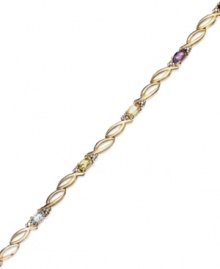 All the colors of the rainbow. Victoria Townsend's oval link bracelet features oval-cut amethyst (1/2 ct. t.w.), blue topaz (1/4 ct. t.w.), citrine (1/5 ct. t.w.), garnet (1/2 ct. t.w.), peridot (1/4 ct. t.w.) and diamond accents. Set in 18k gold over sterling silver. Approximate length: 7-1/4 inches. All the colors of the rainbow. Victoria Townsend's oval link bracelet features oval-cut amethyst (1/2 ct. t.w.), blue topaz (1/4 ct. t.w.), citrine (1/5 ct. t.w.), garnet (1/2 ct. t.w.), peridot (1/4 ct. t.w.) and diamond accents. Set in 18k gold over sterling silver. Approximate length: 7-1/4 inches.