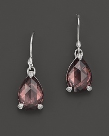 Pear-shaped raspberry crystal is set in sterling silver on these classic Judith Ripka earrings. Pear-shaped raspberry crystal is set in sterling silver on these classic Judith Ripka earrings.
