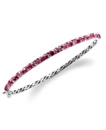 Slim, stackable style. Kaleidoscope's thin shimmering bangle makes a statement all its own, but can also be stacked with similar styles for a trendy layered look. Features round-cut fuchsia, light rose and white confetti crystals with with Swarovski Elements. Set in sterling silver. Bracelet features a hinge clasp. Approximate diameter: 2-1/2 inches. Slim, stackable style. Kaleidoscope's thin shimmering bangle makes a statement all its own, but can also be stacked with similar styles for a trendy layered look. Features round-cut fuchsia, light rose and white confetti crystals with with Swarovski Elements. Set in sterling silver. Bracelet features a hinge clasp. Approximate diameter: 2-1/2 inches.