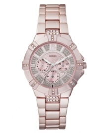 Ladylike with pink tones and glistening crystals, this GUESS watch is a chic delight. Ladylike with pink tones and glistening crystals, this GUESS watch is a chic delight.