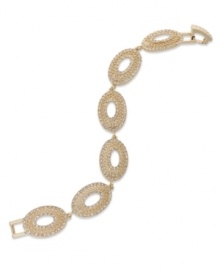 An elegant bracelet made for that special occasion. This Charter Club design sparkles with crystal accents on oval-links. Crafted in 14k gold-plated mixed metal. Approximate length: 7 inches.