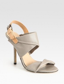 Wide leather straps with an adjustable slingback and a skinny heel. Self-covered heel, 4 (100mm)Leather upperLeather lining and solePadded insoleMade in Italy Wide leather straps with an adjustable slingback and a skinny heel. Self-covered heel, 4 (100mm)Leather upperLeather lining and solePadded insoleMade in Italy