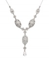 An elegant Y. Eliot Danori's intricate drop necklace features unique, oval-shaped links decorated with sparkling crystals and round-cut cubic zirconias (1 ct. t.w.). Set in silver tone mixed metal. Approximate length: 16 inches + 2-inch extender. Approximate drop: 4-1/2 inches.