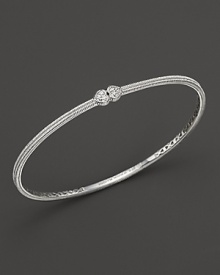 Two white sapphire hearts meet on this slim sterling silver bangle. Two white sapphire hearts meet on this slim sterling silver bangle.
