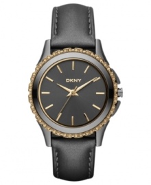 Dusky tones on rich leather blend with sparkling golden accents on this DKNY watch.