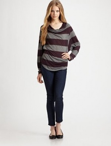Bold stripes highlight chic dolman sleeves and a draped neckline in this contemporary-chic topper.Cowlneck Dolman sleeves Pullover style About 27 from shoulder to hem 85% viscose/15% wool Dry clean Made in USA of imported fabric Bold stripes highlight chic dolman sleeves and a draped neckline in this contemporary-chic topper.Cowlneck Dolman sleeves Pullover style About 27 from shoulder to hem 85% viscose/15% wool Dry clean Made in USA of imported fabric