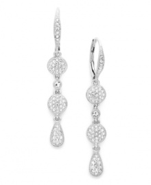 Dramatic and dazzling. Eliot Danori's sparkling earrings style features round and pear-shaped drops encrusted with pave-set crystals. Set in silver tone mixed metal. Approximate drop: 1-1/2 inches. Dramatic and dazzling. Eliot Danori's sparkling earrings style features round and pear-shaped drops encrusted with pave-set crystals. Set in silver tone mixed metal. Approximate drop: 1-1/2 inches.