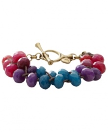 Vibrant hues add a fresh touch to your look. This toggle bracelet from Fossil features a waxed chocolate cord decorated with color-dyed jade beads. Crafted in brass tone mixed metal. Toggle and bar closure. Approximate diameter: 7-1/2 inches. Vibrant hues add a fresh touch to your look. This toggle bracelet from Fossil features a waxed chocolate cord decorated with color-dyed jade beads. Crafted in brass tone mixed metal. Toggle and bar closure. Approximate diameter: 7-1/2 inches.