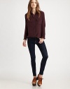 The perfect wardrobe essential, crafted from gorgeous silk with a versatile long hem.Point collarButton frontTwo flap chest pocketsLong sleeves with button cuffsBack yoke and box pleatShirttail hemAbout 27 from shoulder to hemSilkDry cleanImported
