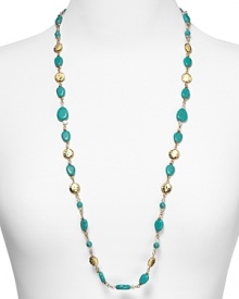 Embellished with striking turquoise beads and hammered stations, Lauren Ralph Lauren's link necklace is a striking adornment. Layer it over a crisp collar for a cool contrast. Embellished with striking turquoise beads and hammered stations, Lauren Ralph Lauren's link necklace is a striking adornment. Layer it over a crisp collar for a cool contrast.