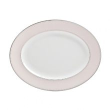 World-renowned fashion designer Monique Lhuillier collaborated with Waterford to create this fine china platter in beautiful blush tones adapted from her brilliant couture bridal gowns and red carpet creations. World-renowned fashion designer Monique Lhuillier collaborated with Waterford to create this fine china platter in beautiful blush tones adapted from her brilliant couture bridal gowns and red carpet creations.
