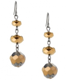 Very versatile. With their two-tone bronze and silver coloring, Kenneth Cole New York's cherry bead linear drop earrings are easy to incorporate into your wardrobe. Made in hematite tone mixed metal. Approximate drop: 2-1/3 inches. Very versatile. With their two-tone bronze and silver coloring, Kenneth Cole New York's cherry bead linear drop earrings are easy to incorporate into your wardrobe. Made in hematite tone mixed metal. Approximate drop: 2-1/3 inches.
