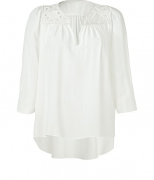 Bring elegant, bohemian style to your casual look with this embroidered silk top from Schumacher - V-neck, embroidered shoulders, 7/8 flared sleeves, gathering at bust, asymmetrical hem with vents, relaxed fit - Wear with flared jeans and platform heels Bring elegant, bohemian style to your casual look with this embroidered silk top from Schumacher - V-neck, embroidered shoulders, 7/8 flared sleeves, gathering at bust, asymmetrical hem with vents, relaxed fit - Wear with flared jeans and platform heels