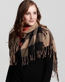 In Burberry's signature colorway, this check printed cotton scarf adds instant British cool. In Burberry's signature colorway, this check printed cotton scarf adds instant British cool.