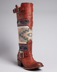 Stand tall, Southwestern style, in FREEBIRD by Steven's trailblazing boots. Pairing distressed leather and blanket-patterned fabric, they are as timeless as your favorite turquoise-and-silver jewelry. Stand tall, Southwestern style, in FREEBIRD by Steven's trailblazing boots. Pairing distressed leather and blanket-patterned fabric, they are as timeless as your favorite turquoise-and-silver jewelry.